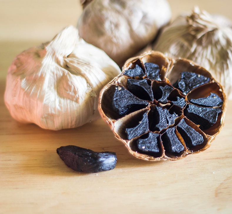 Sliced black garlic bulb